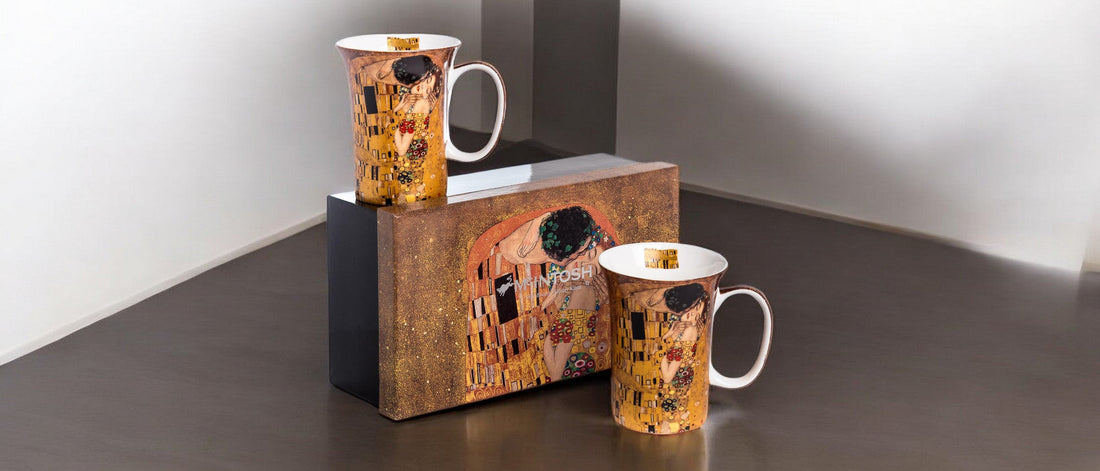 Corporate holiday gift sets with Canadian art mugs, gourmet treats and spa items arranged professionally for business gifting