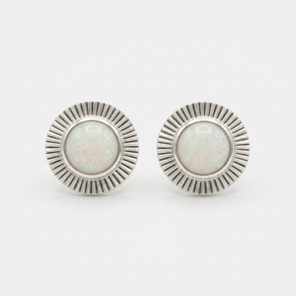 Improved opal earrings with fluted silver surrounds